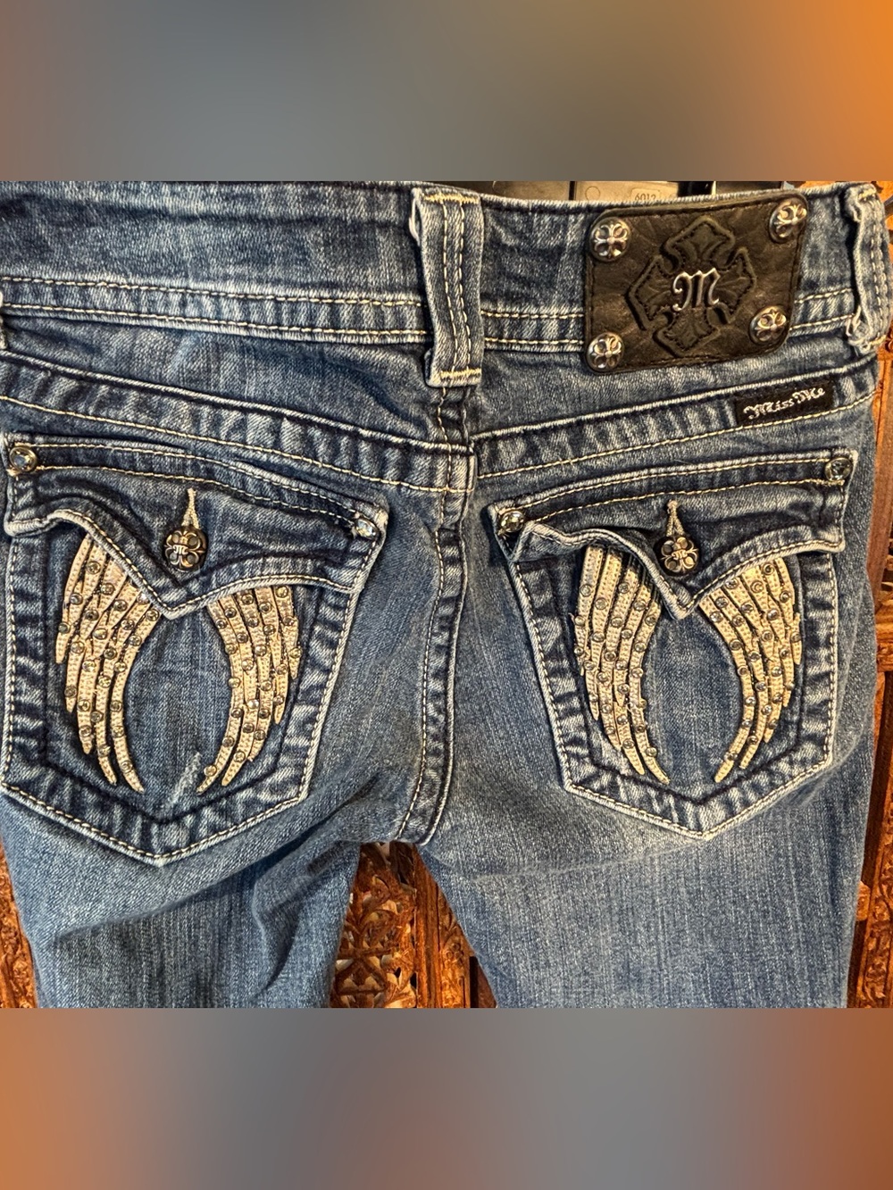 Miss Me Women's Boot-Cut Jeans in Medium Blue Fade Angel Wings on Pockets